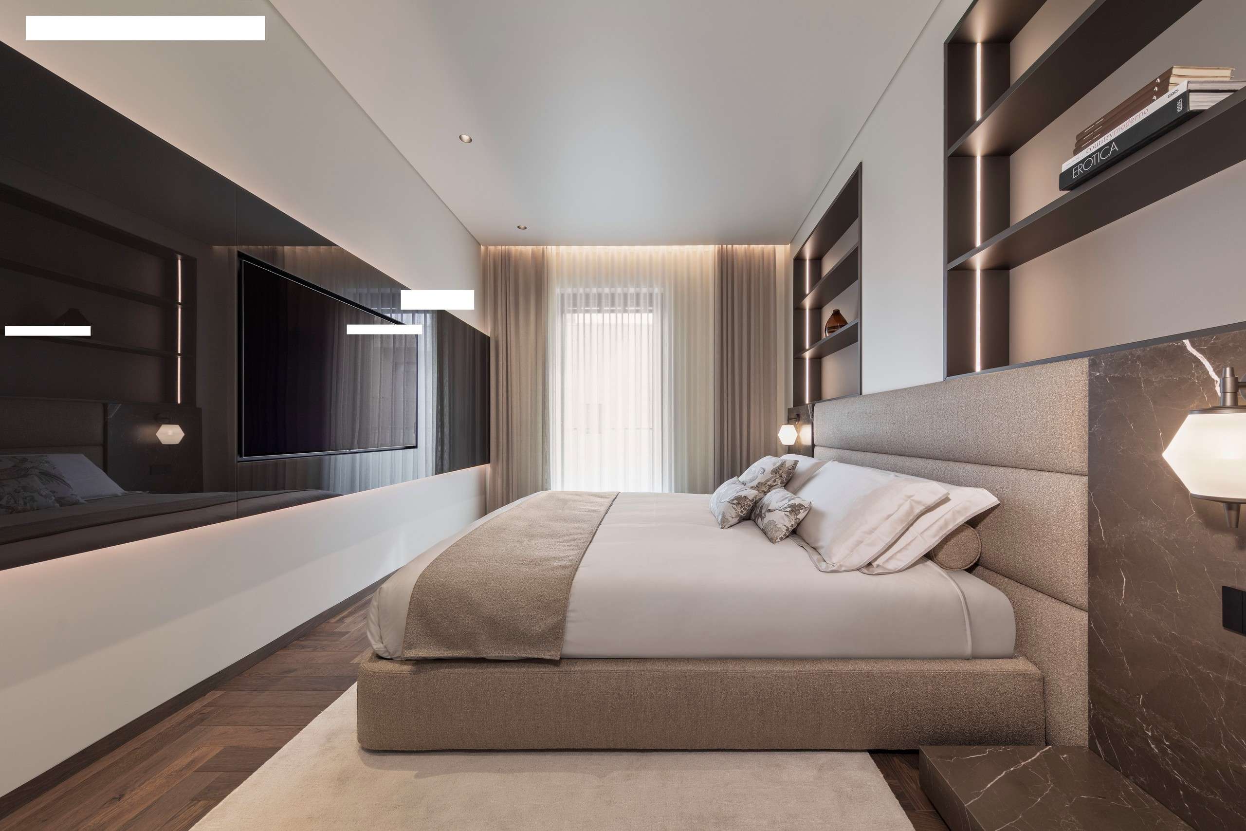 Bedroom with an upholstered bed, a wall-mounted screen and timber shelving