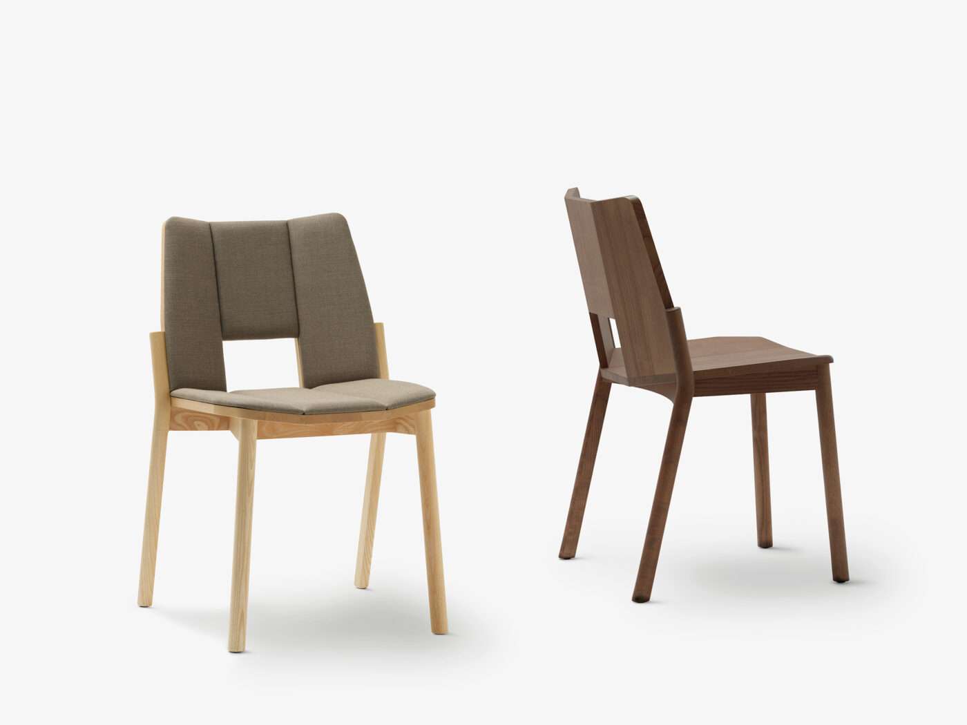 Two wooden dining chairs, one with an upholstered seat and back