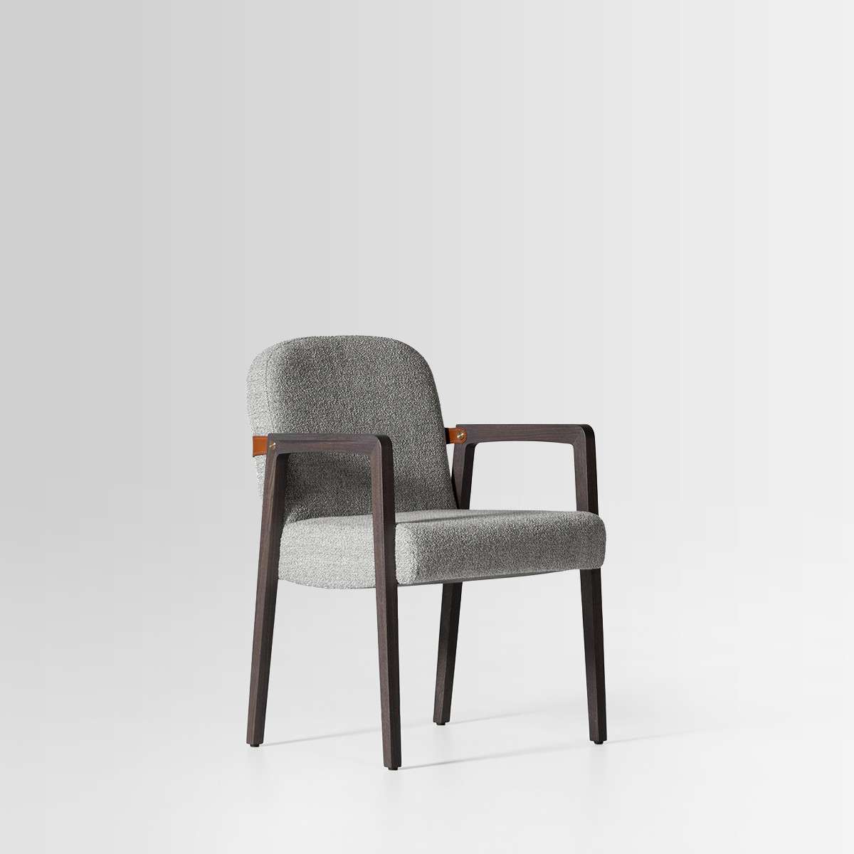Grey upholstered armchair with a dark timber frame