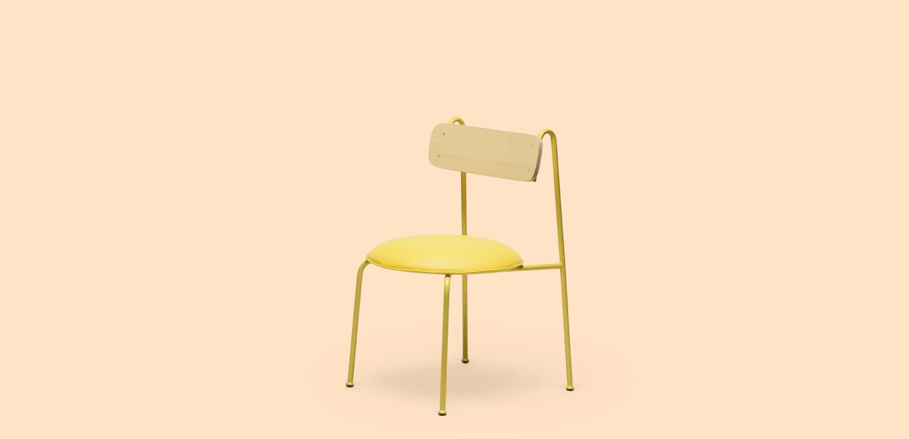 Yellow metal chair with a pale wooden backrest
