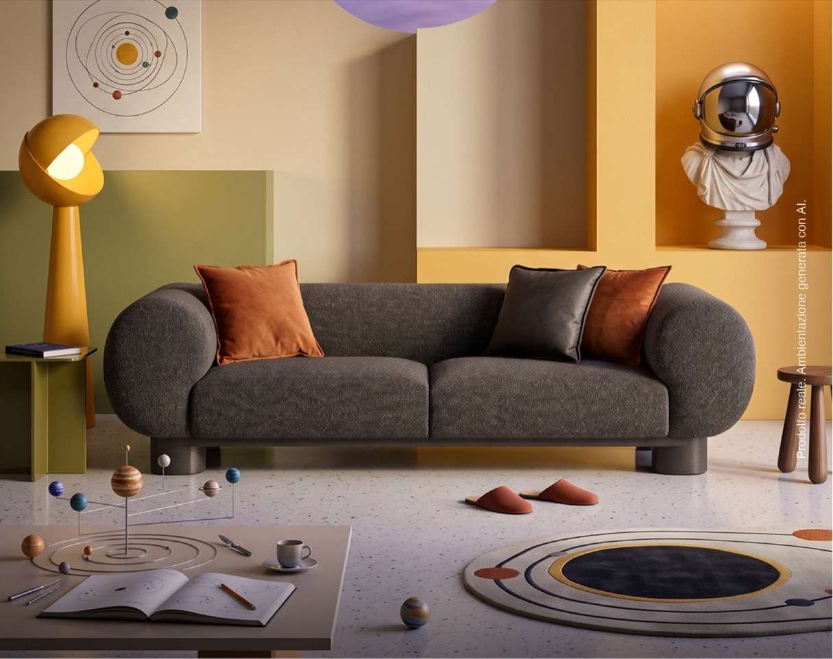 Grey sofa with rust cushions in a playful room with a globe lamp