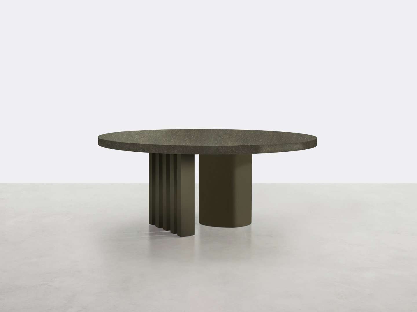 Round table with a dark top on a fluted pedestal