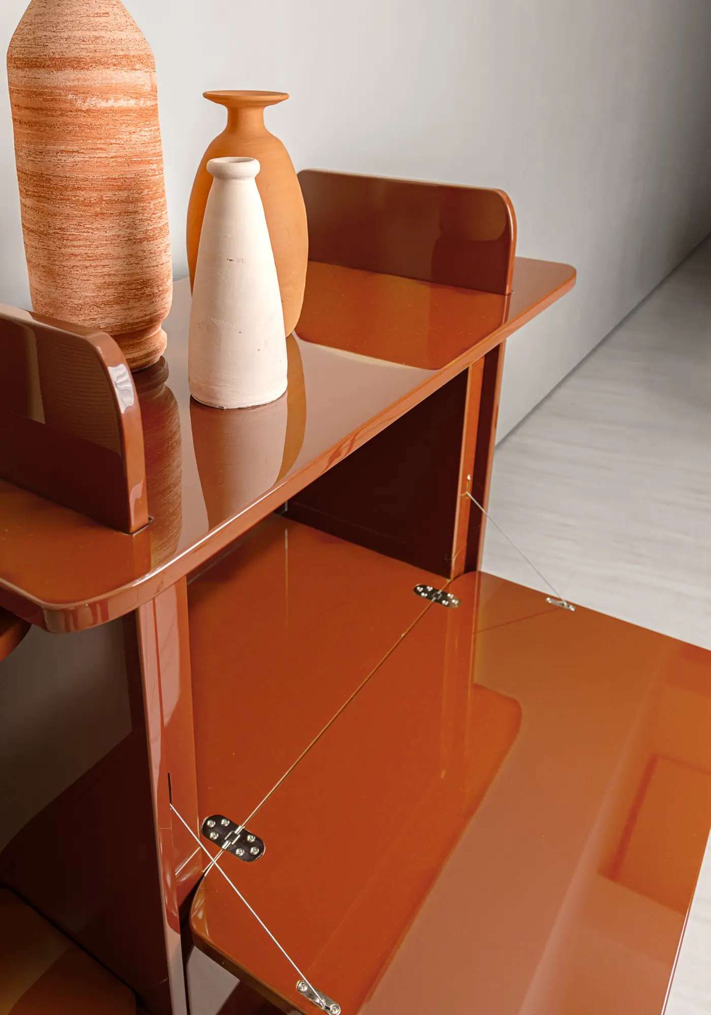 Glossy amber lacquered shelving