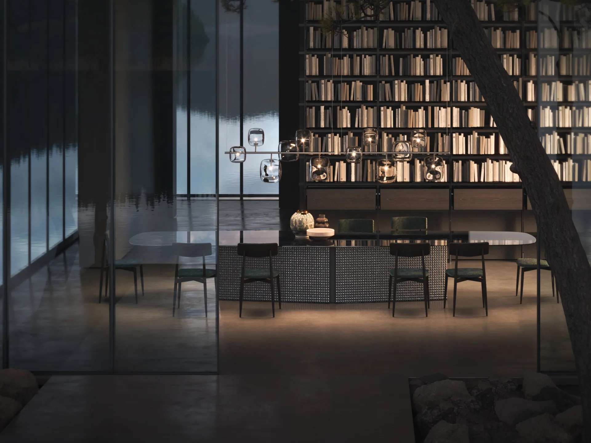 Dining room with a long marble table and pendant lights